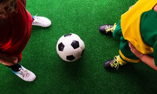 two-unrecognizable-little-football-players-against-2025-10-02-11-43-37-utc